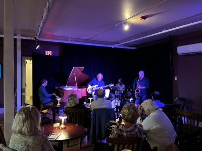 Al Hospers (center) performs at Friday Night Jazz on 7/26